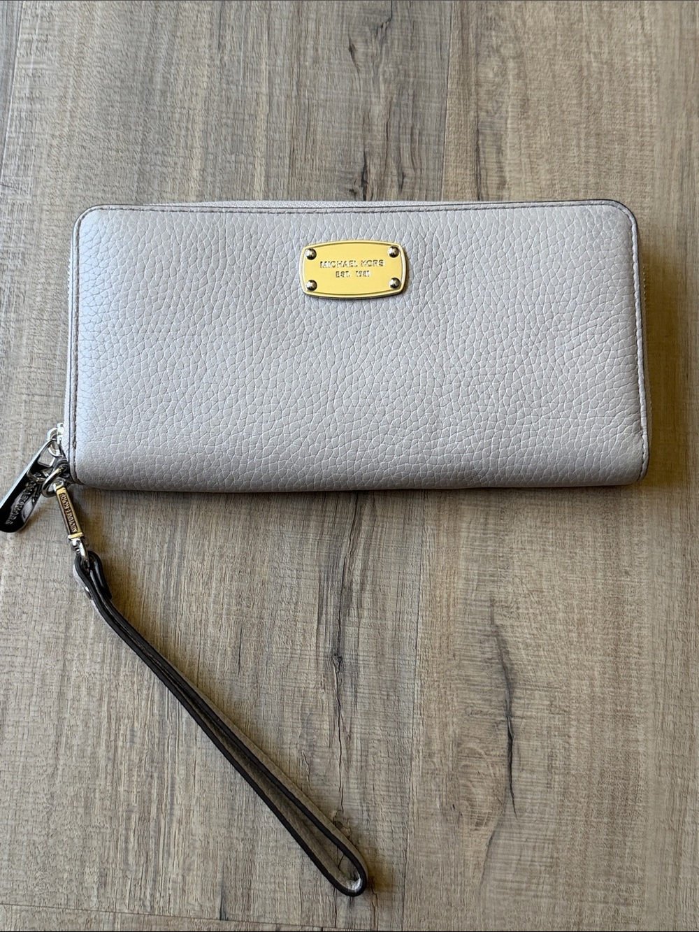 Michael Kors Pebbled Leather Zip Wristlet in Light Gray with Gold Plate